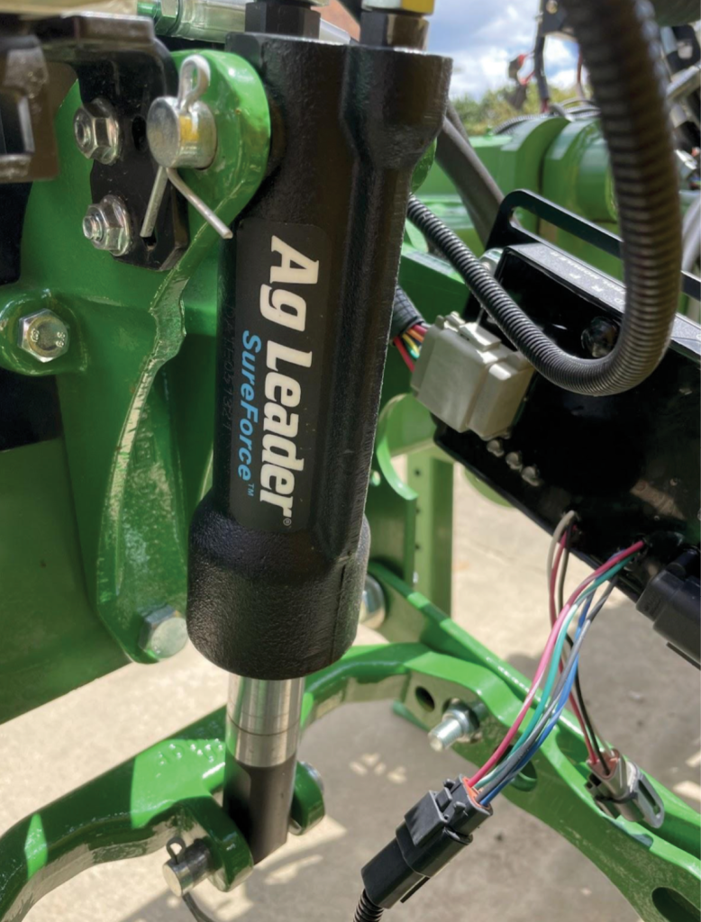 an image of hydraulics on a commercial harvester.